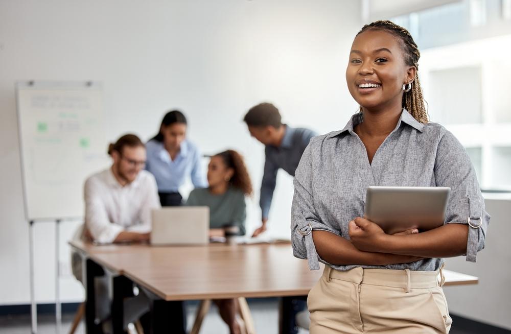 Smile,,Boardroom,And,Portrait,Of,A,Black,Woman,With,A