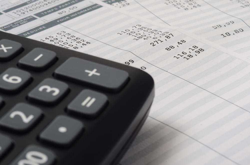 Euro,Pay,Slip,And,Calculator,,Close,Up,For,Payroll,Or